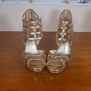 Michael Kors gladiator style heels. In excellent condition. Size 8